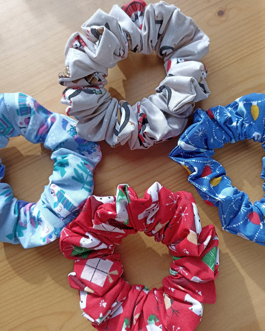 Christmas pack of four hair scrunchies. Made with strong elastic to give the perfect hold on your hair.