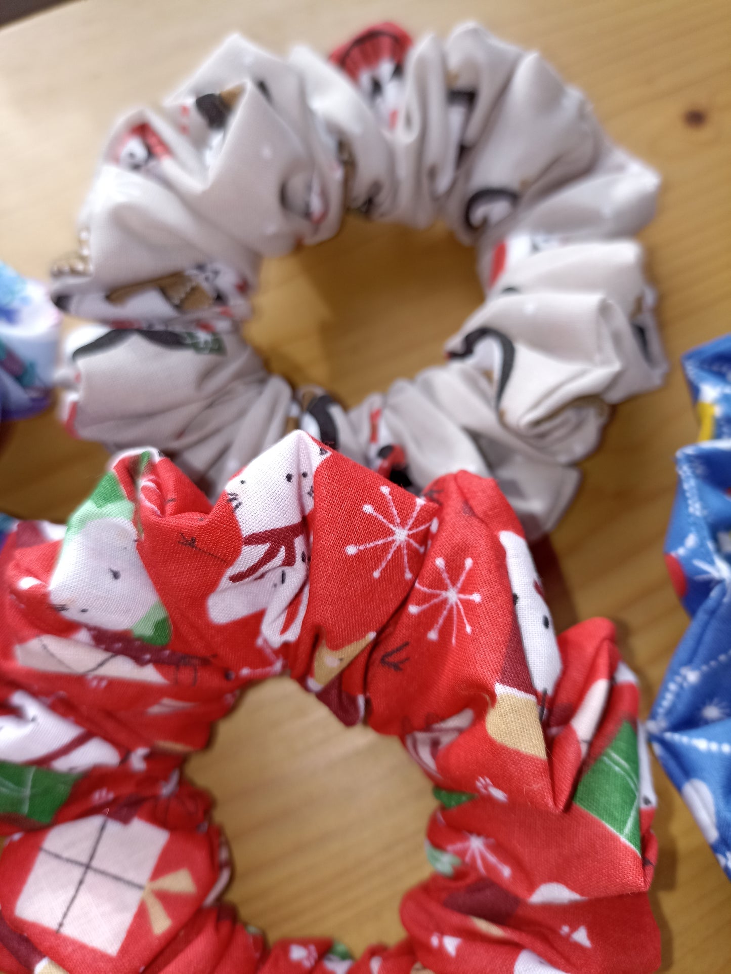 Christmas pack of four hair scrunchies. Made with strong elastic to give the perfect hold on your hair.