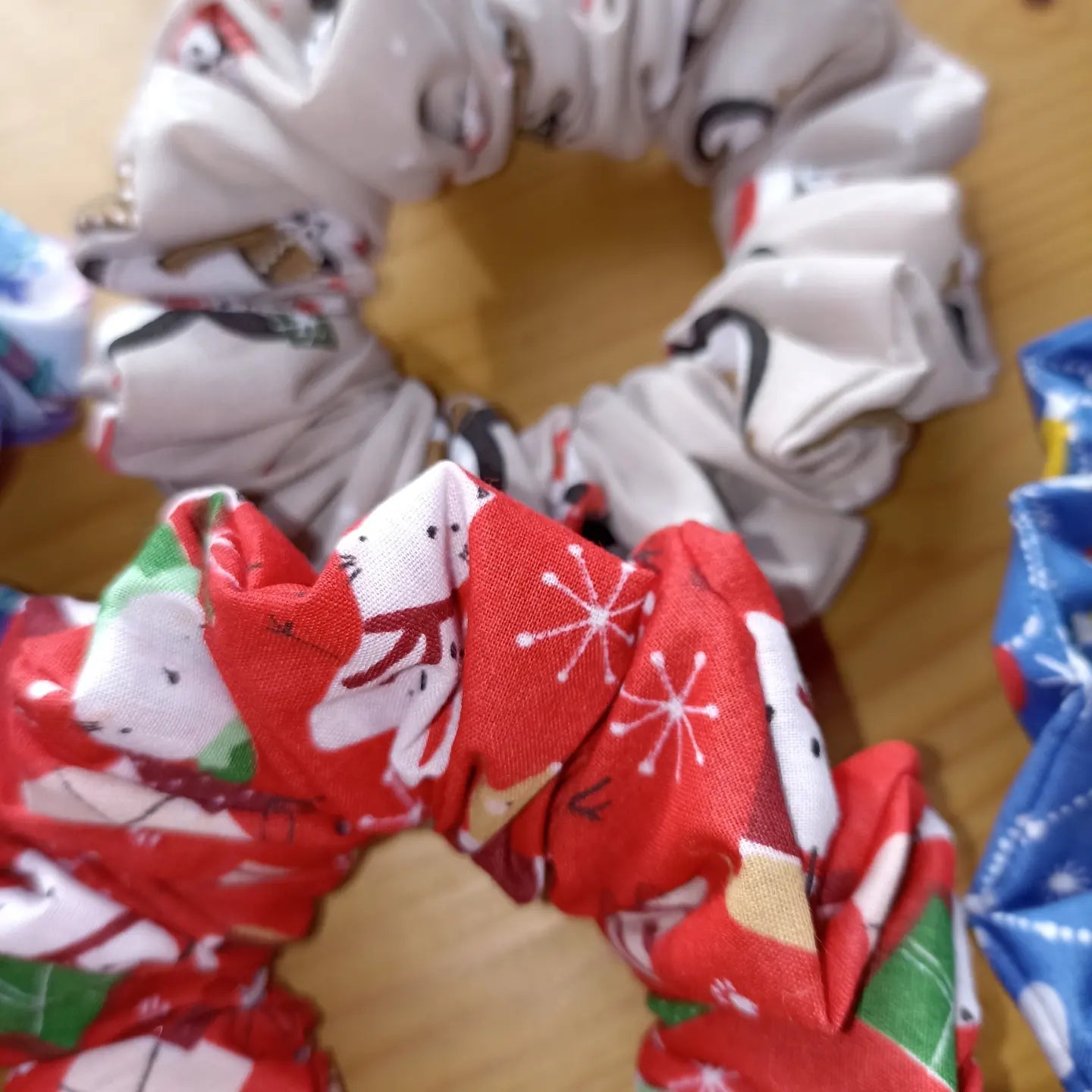 Christmas pack of four hair scrunchies. Made with strong elastic to give the perfect hold on your hair.