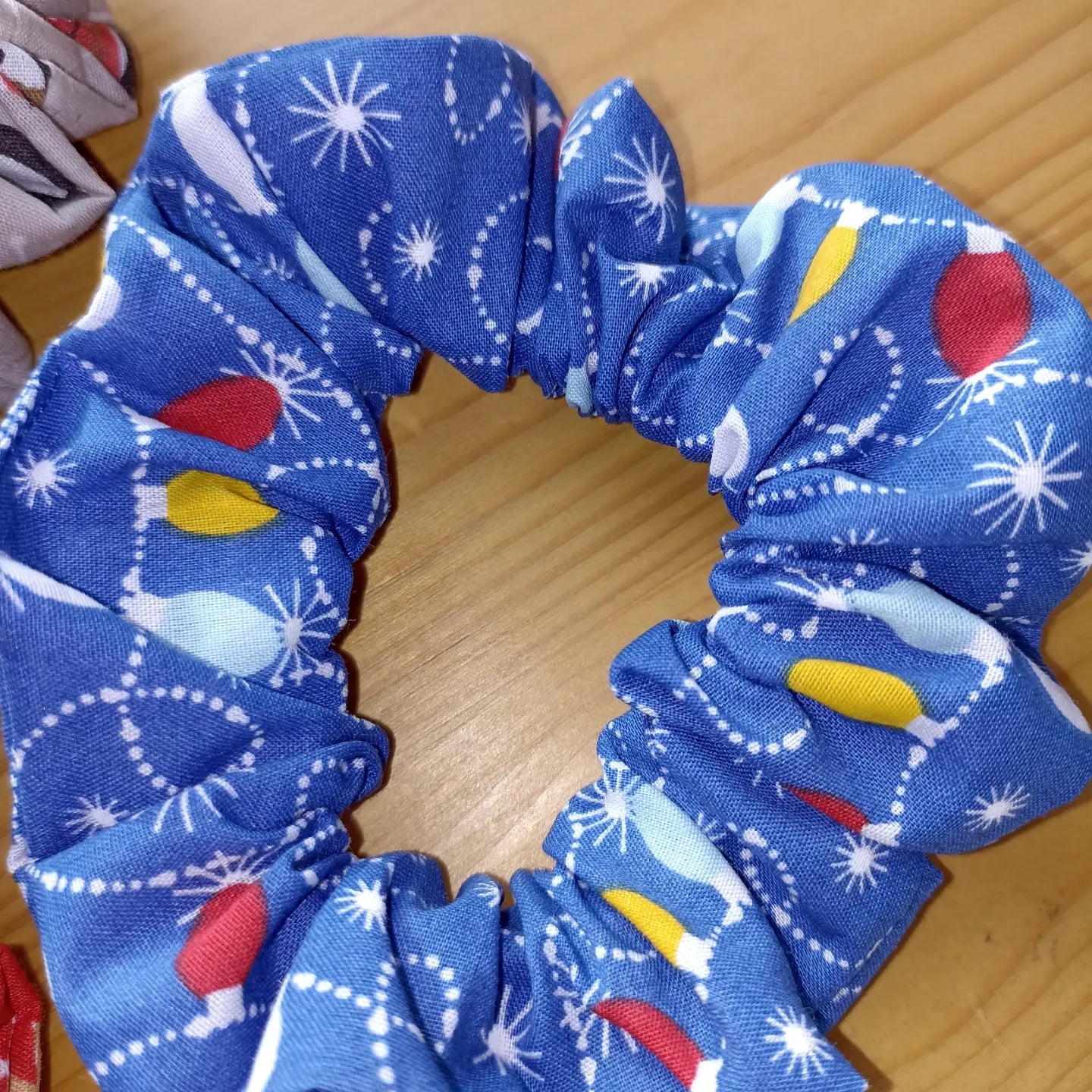 Christmas pack of four hair scrunchies. Made with strong elastic to give the perfect hold on your hair.